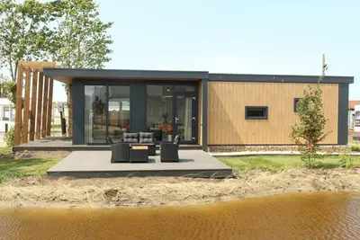 Image de Enjoy stylish comfort in the Duinrand Lodge for 6 persons. This cozy and spacious holiday home offers everything you need for a truly relaxing holiday.