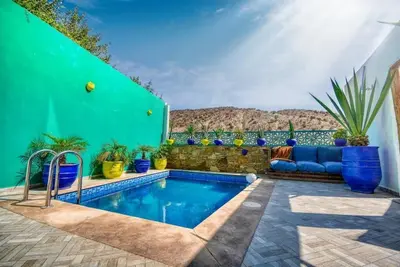 Image de HoneyPath Riad · Piscine · Vue sur l'Atlas · Riad Marocain Authentique