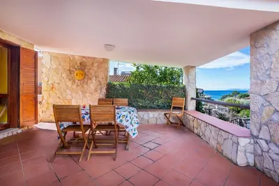 Image de Spacious and charming 80 square meters villa, perfect for six people, located within the Kala&Moru Residence. The property enjoys an ideal location thanks to its proximity to the beach, about a 10-minute walk: the crystal-clear Sardinian sea offers relaxi