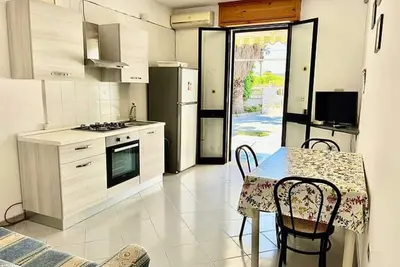 Image de Appartement 'Villa Ruggieri - Semiterra' avec terrasse et jardin privés