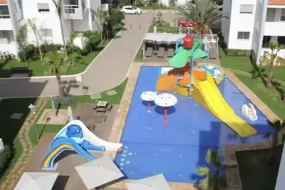 Image de Appartement avec piscine et toboggan à Mohammedia – proche plage
