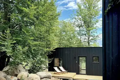 Image de Cabanes au bord du lac dans les forêts près d'Immeln
