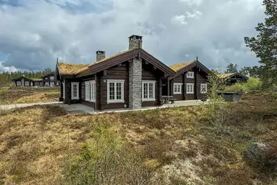 Image de Cabane en bois avec jacuzzi et pistes de ski à Veggli
