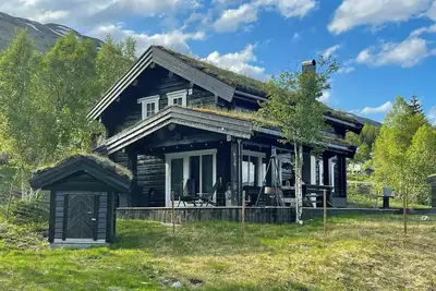Image de Cabane en bois avec spa extérieur près de Stranda