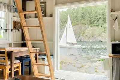 Image de Maison de marin avec ponton au bord de la mer à Bamble