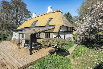Image de Maison à colombages au toit de chaume datant de 1785, sur l'île de Langeland