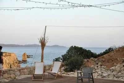 Image de Rénovée grange avec vue sur la mer à Cova