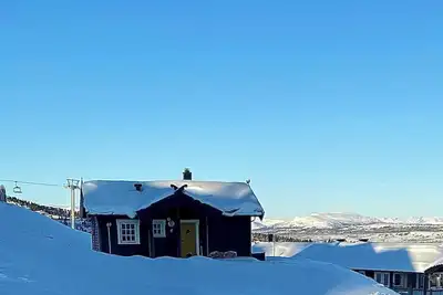 Image de Chalet traditionnel avec annexe à la montagne