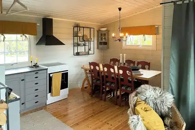 Image de Cabine familiale avec soleil et vue à Ljøsheim