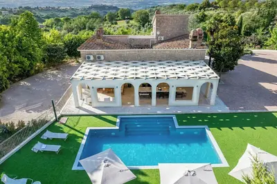 Image de Appartement dans une villa avec piscine