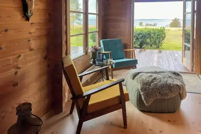 Image de Cabane en rondins avec vue sur le fjord d'Ise