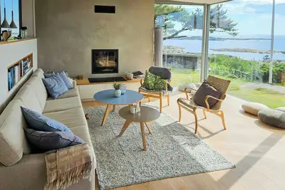 Image de Cabane au bord de la mer avec des espaces extérieurs uniques