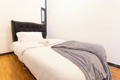 Image de Spacious 1br Apt w/extra bed & gym near yaya Centre