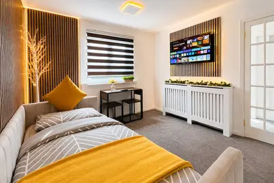 Image de Appartement moderne entièrement équipé avec enregistrement automatique et parking gratuit