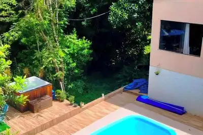 Image de Refúgio na Serra da Cantareira em estilo rústico/contemporâneo