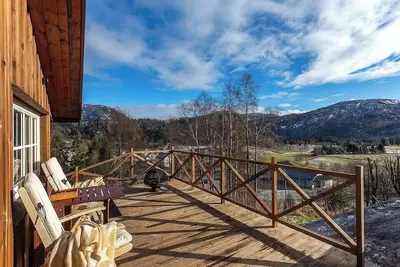 Image de Cabane avec vue panoramique et bain nordique chauffé au feu de bois