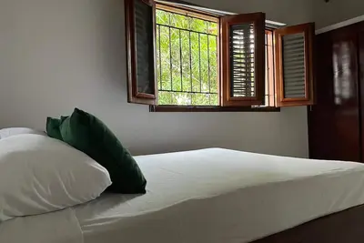 Image de Traditional 2br Dominican Home with Private Balcony - 10 Min Walk to Beach