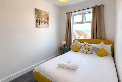 Image de Cosy 3 Bed Home | Sleeps 7 | 4 Beds | Free Parking