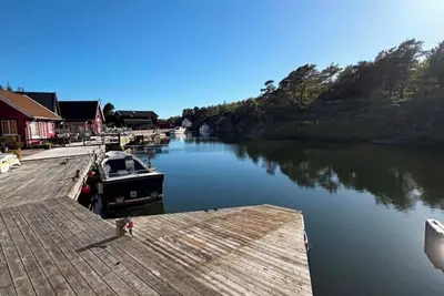 Image de Waterfront quaint 4-bedroom cabin in adorable Kristiansand for relaxing stays