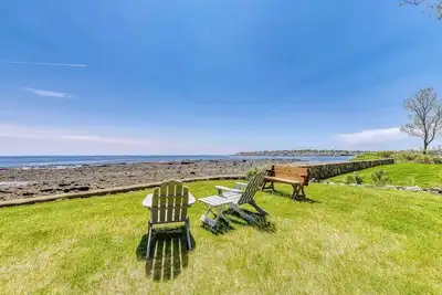 Inviting oceanfront home with fireplace, firepit, & views from every room