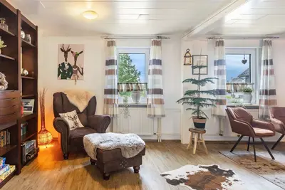 Image de Appartement 'Schieferstübchen - Großes' avec terrasse partagée, jardin privé et Wi-Fi