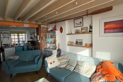 Image de Stylish beach retreat with sunset views.