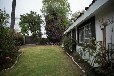 Image de House with garden in front of the Pyramid of Cholula, Puebla, Mx