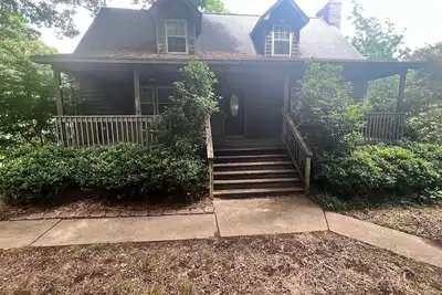 Image de Beautiful family friendly 5-bedroom house with Ac on wooded lot near Table Rock.