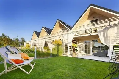 Image de Maison de vacances avec jardin, climatisation