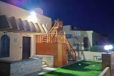 Image de First row chalet (beachfront) Full Ac  Beachhouse