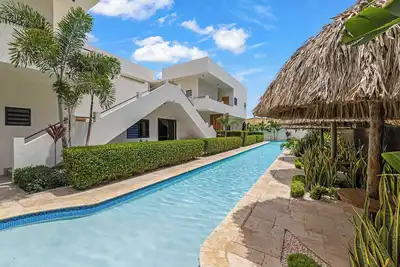 Image de Ayana Tropical Oasis | Pool | Near Mambo Beach