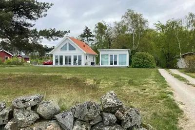Image de Maison lumineuse avec vue sur la mer à Lindö