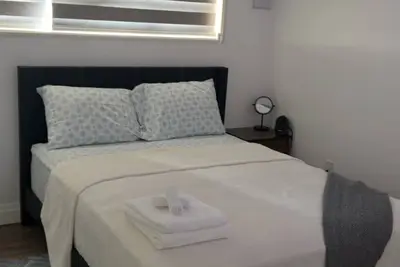 Image de 🏡 Modern 2-Bedroom Private Suite Near Niagara Falls | Sleeps 4 | Free Parking