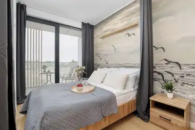 Image de Air-conditioned studio | Close to the Lake and the Sea | Balcony