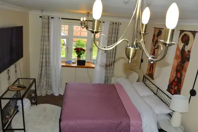 Image de Whole Cosy Home, Sleeps 11 in 4 Bedrooms, full kitchen, 2 toilets, 55\"TVs PetsOK