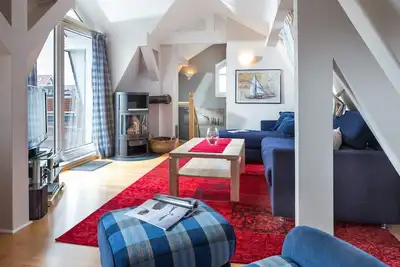 Image de Inseldomizil 4 - Spacious maisonette apartment with two terraces & fireplace