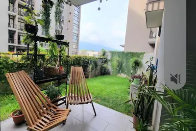 Image de Spacious two-bedroom apartment with garden and views, 35 min to Surf city.