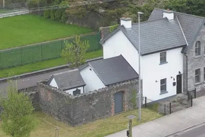 Image de The Station House, Listowel. Historic railway station house beside the Greenway