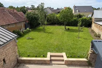 Image de À deux pas des plages du Débarquement! Grande maison tout confort avec jardin.
