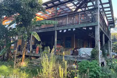 Image de The Big House, a sanctuary in a lush valley bordering the Abel Tasman Np.