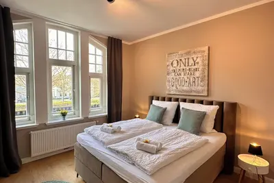 Image de Riverside residence - Stylish old building with balcony, water view & space for the family