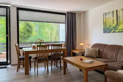 Image de Modern, cozy vacation apartment with pool, right next to the ski slope and the golf course in Winterberg