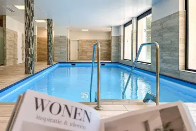 Image de Modern, cozy vacation apartment with pool, right next to the ski slope and the golf course in Winterberg