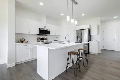 Image de Heartland Stays - Brand New 3 Bed Room Cozy Home with Ac, Garage, Bbq