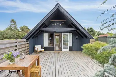 Image de Cozy little holiday home with wilderness bath