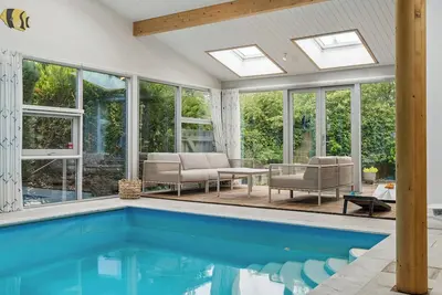 Image de Cozy holiday home with pool by the beach