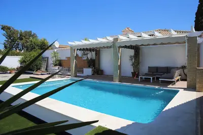 Image de House with a pool, 25 minutes from Seville, 3 suites, spacious outdoor area.