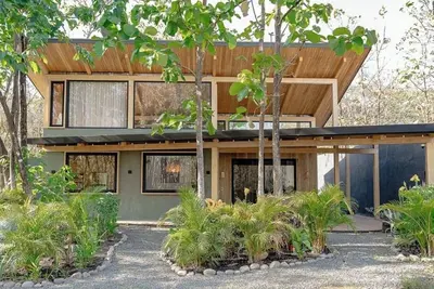 Image de Cozy 1- bedroom w/loft home in Avellanas w/golf cart and airport transport.
