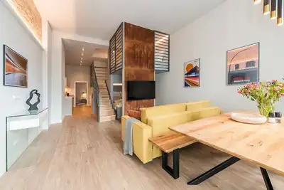 Image de Exclusive Designer Loft Near the Main Train Station