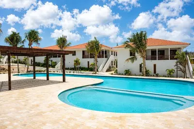 Image de 2br Condo w/ Outdoor Lounge • Vredenberg Village